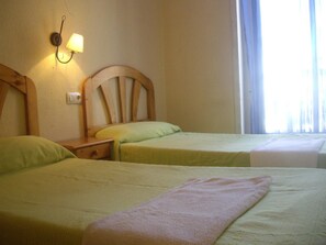 Wi-Fi de cortesia, roupa de cama