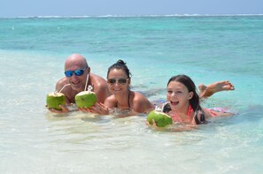On the beach, white sand, free beach shuttle, free beach cabanas