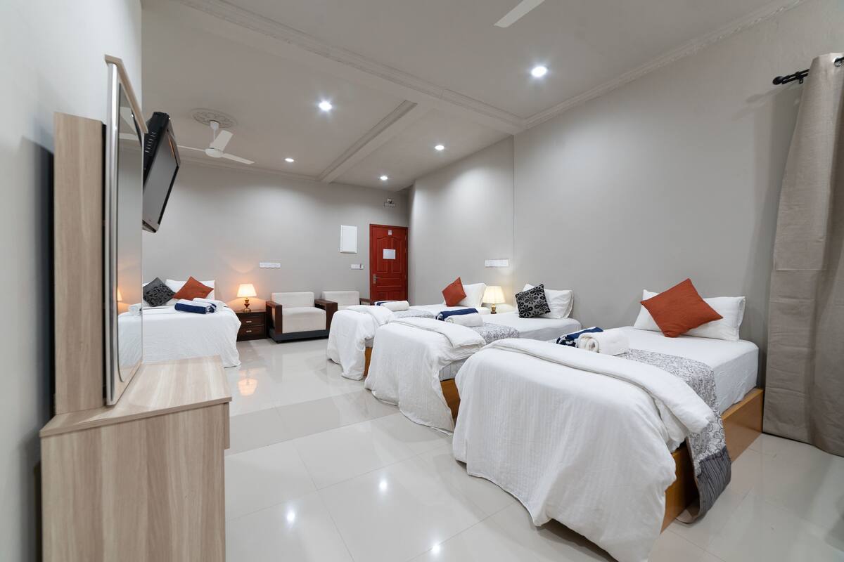 Suíte família | 1 quarto, roupas de cama premium, frigobar, cofres nos quartos