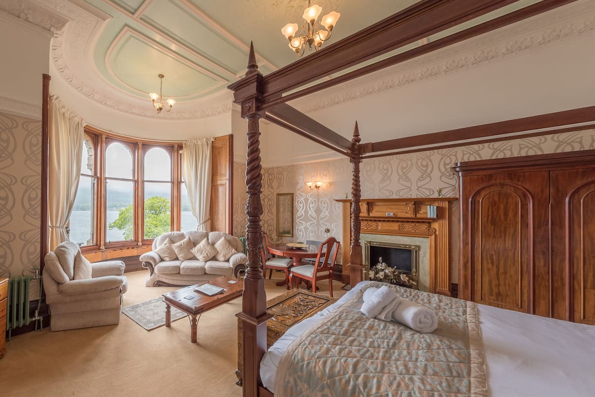 studio suite, four  poster bed, sea  view | hypo-allergenic bedding, individually decorated, individually furnished