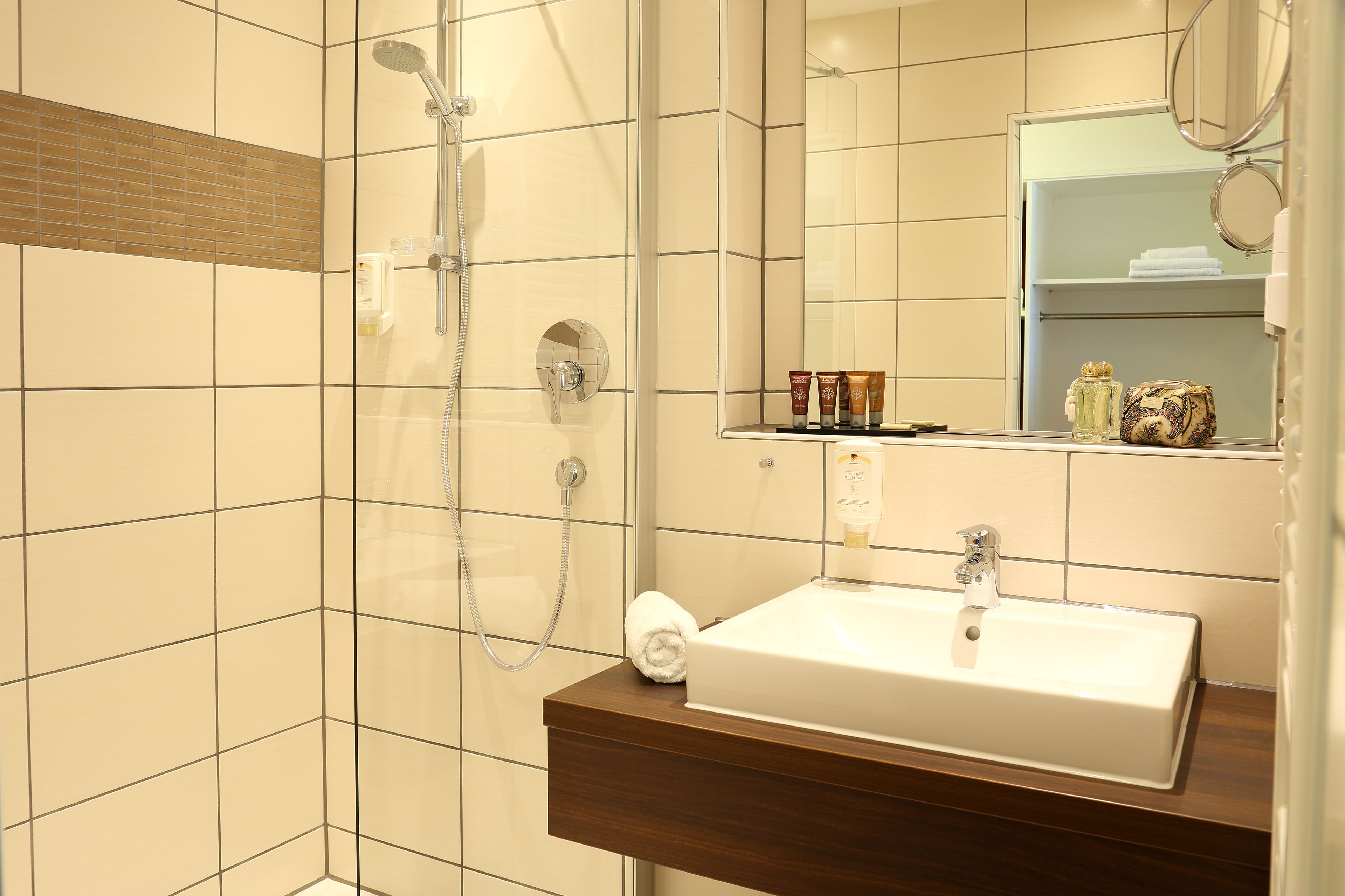 shower, free toiletries, hair dryer, towels