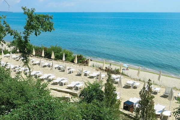 On the beach, beach umbrellas, beach towels, snorkelling