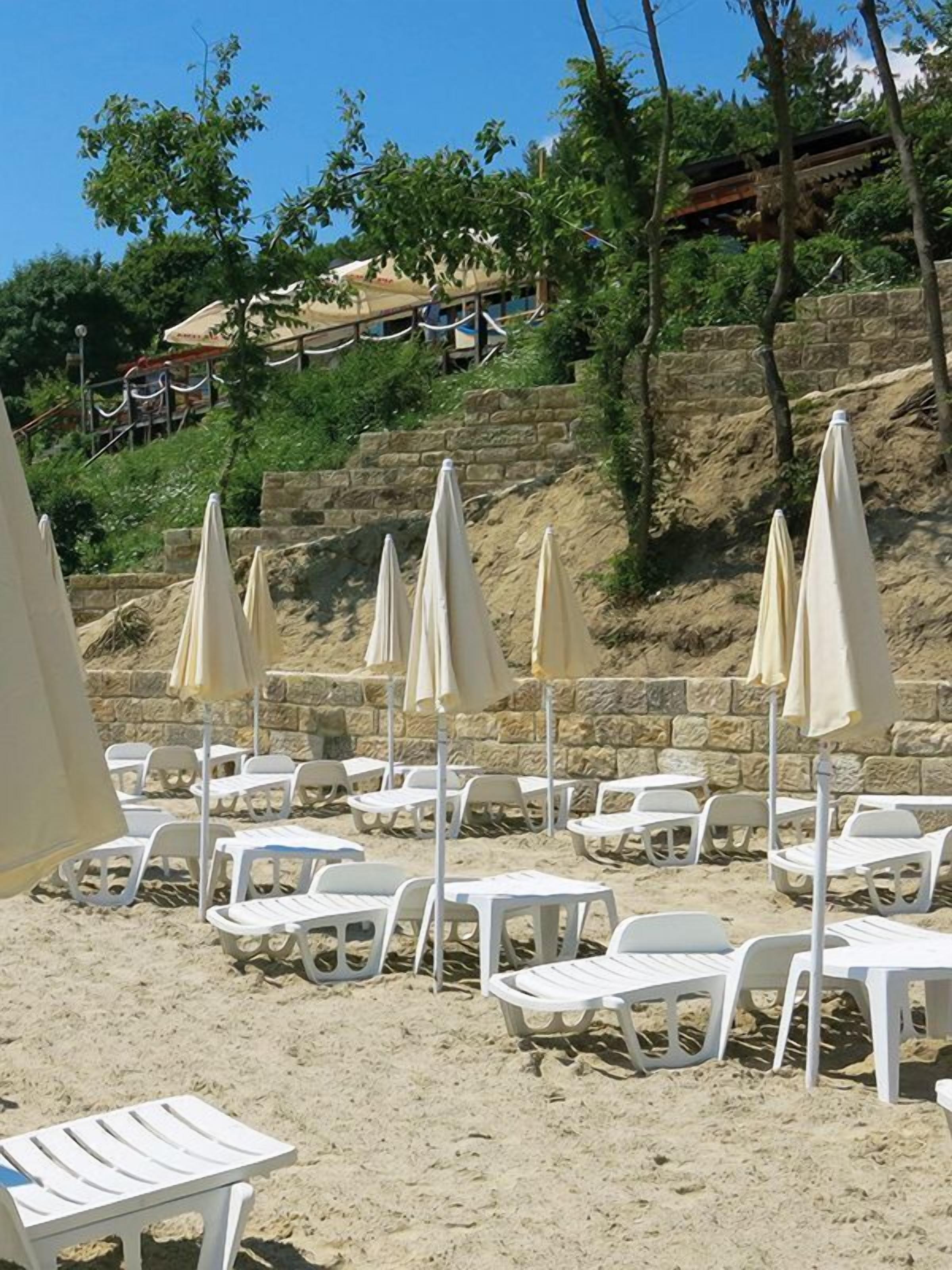 on the beach, beach umbrellas, beach towels, snorkelling