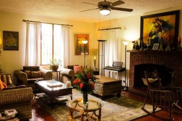 Suite, Private Bathroom (Queen Suite) | Living area | TV, books, computer monitors, printers