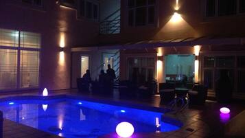 Outdoor pool, pool umbrellas, sun loungers
