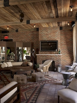 2 bars/lounges, lobby lounge, rooftop bar at Refinery Hotel