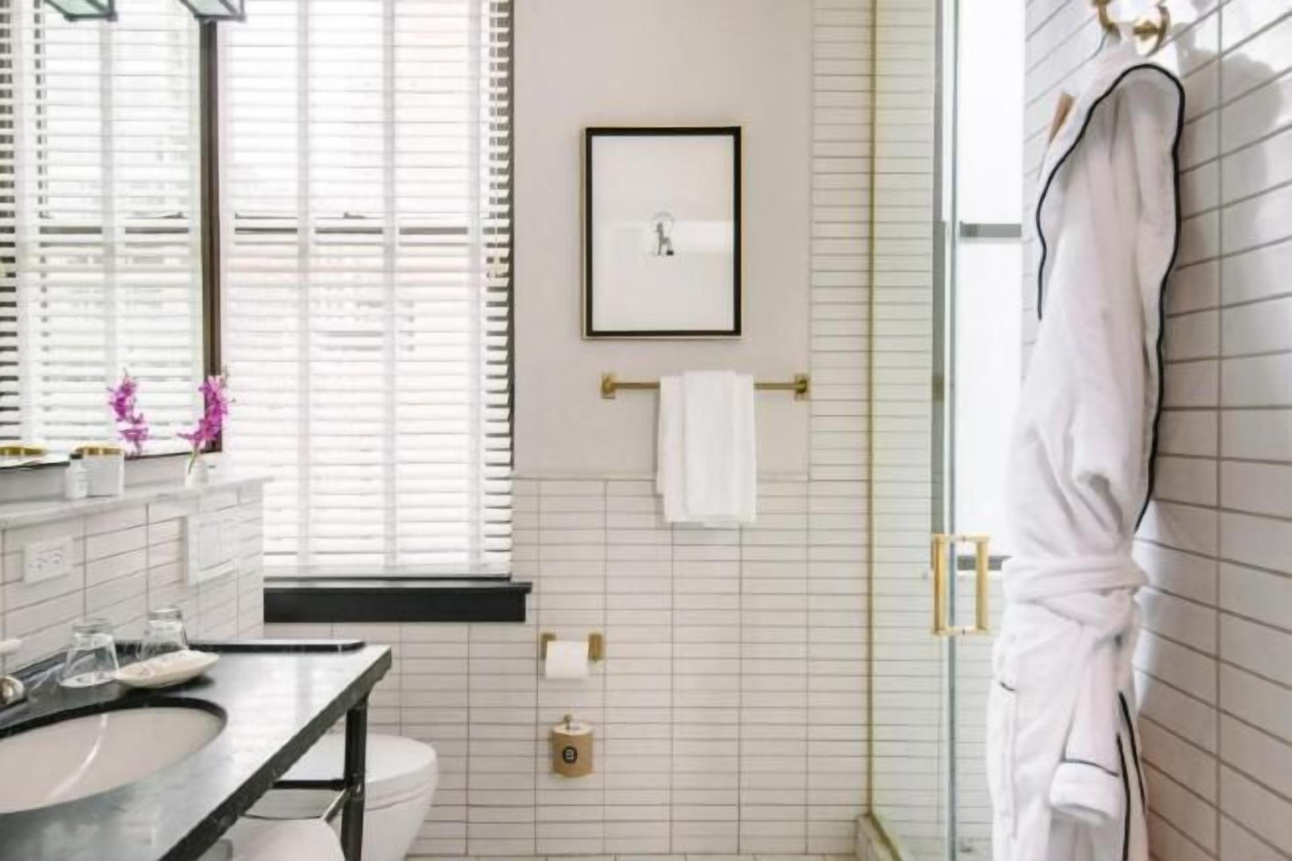 Bathroom | Designer toiletries, hair dryer, bathrobes, towels