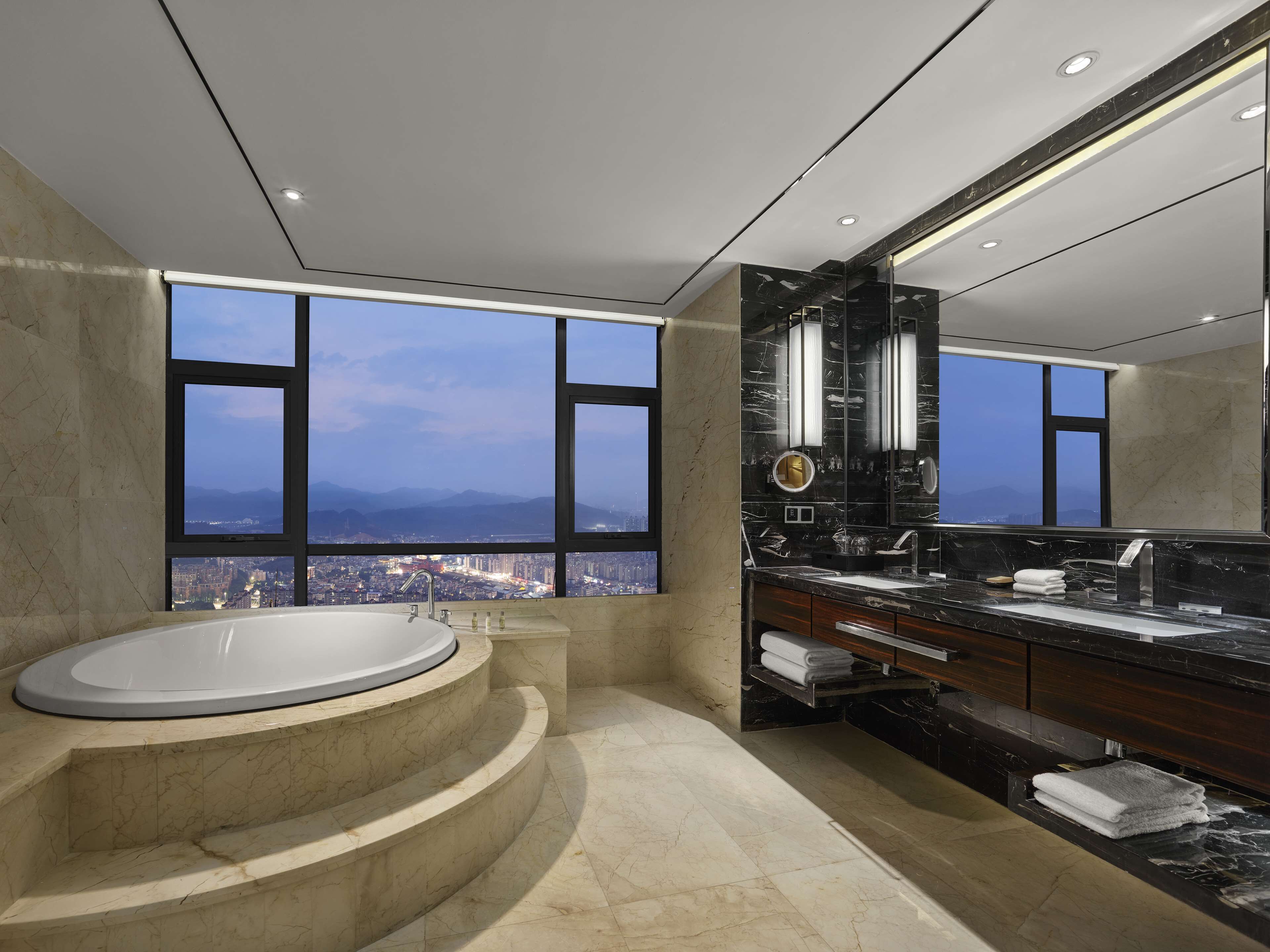 king executive suite | bathroom | separate bathtub and shower, rainfall showerhead, free toiletries