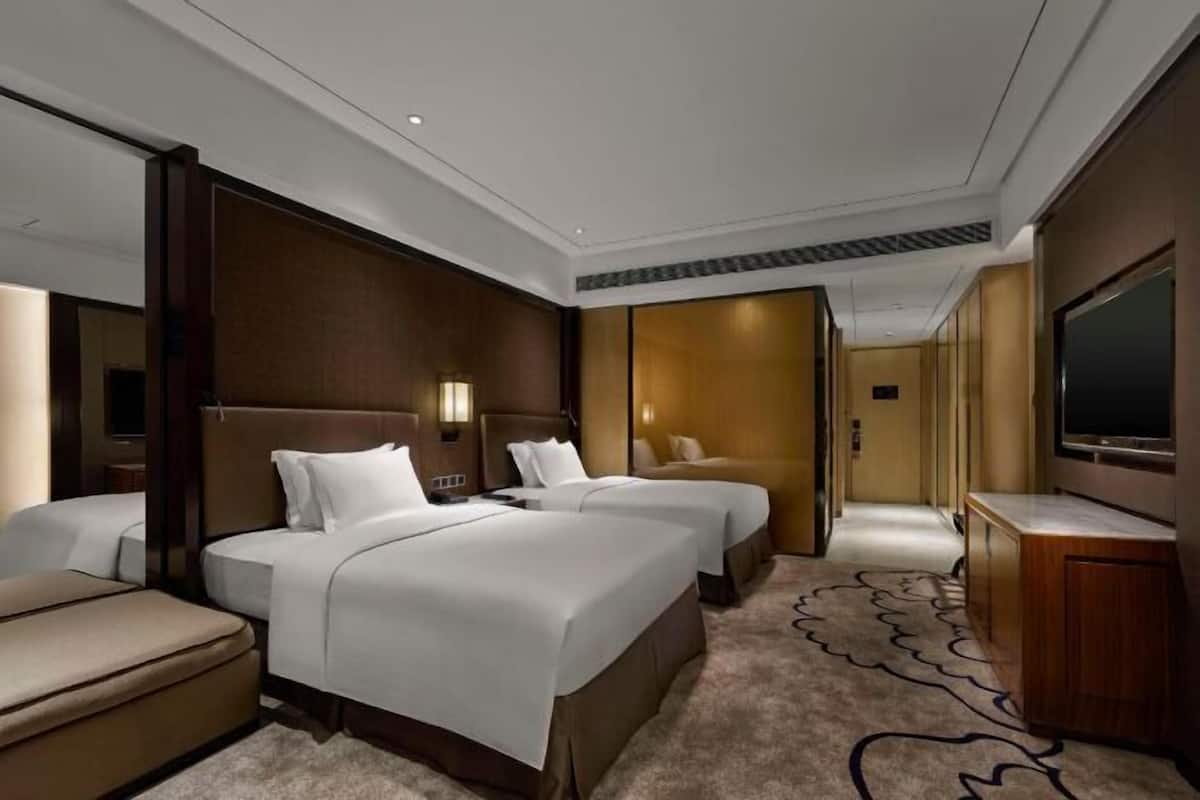 Ropa de cama de alta calidad y minibar