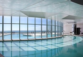Indoor pool, seasonal outdoor pool, cabanas (surcharge), sun loungers at Ocean Casino Resort