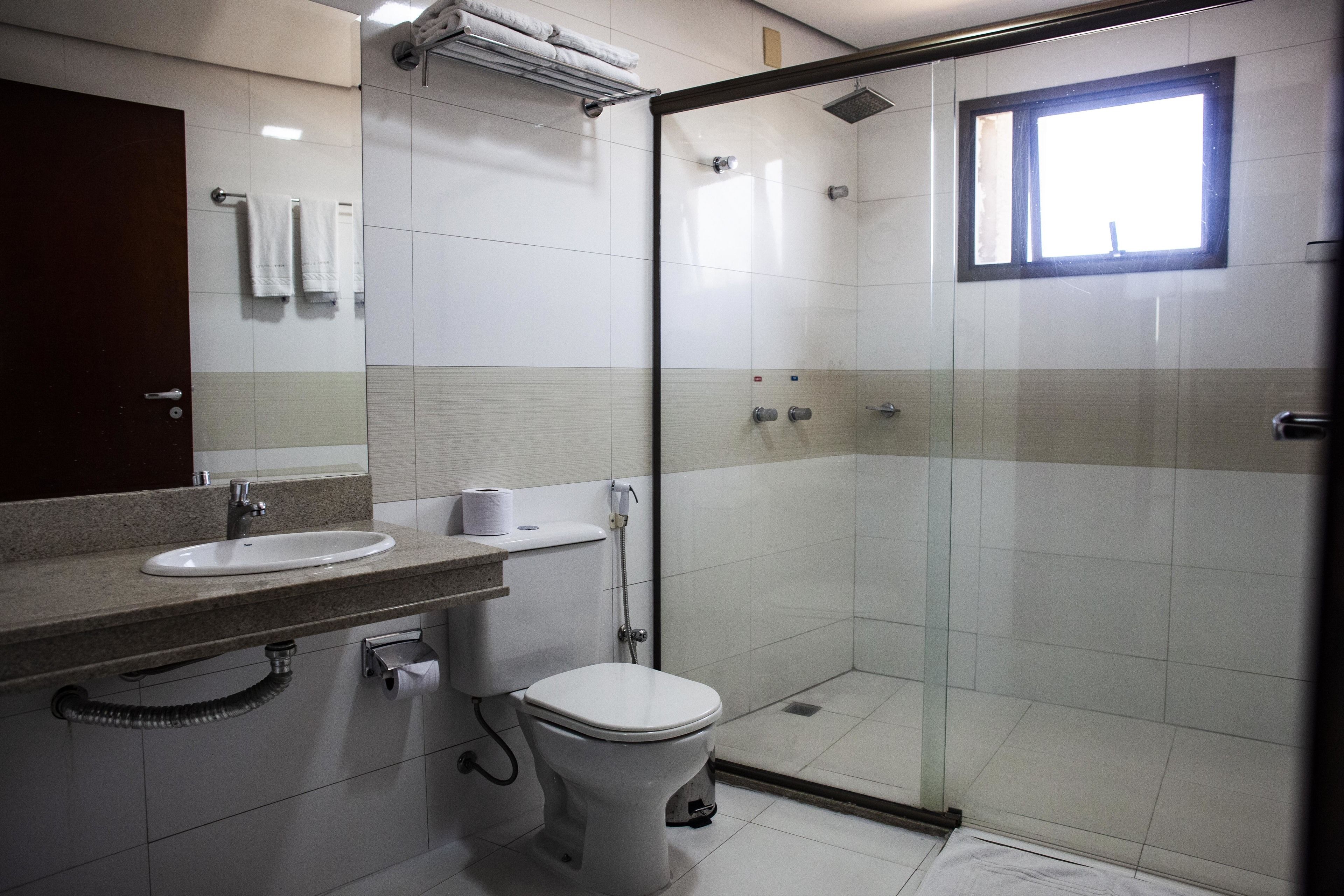 shower, free toiletries, hair dryer, towels