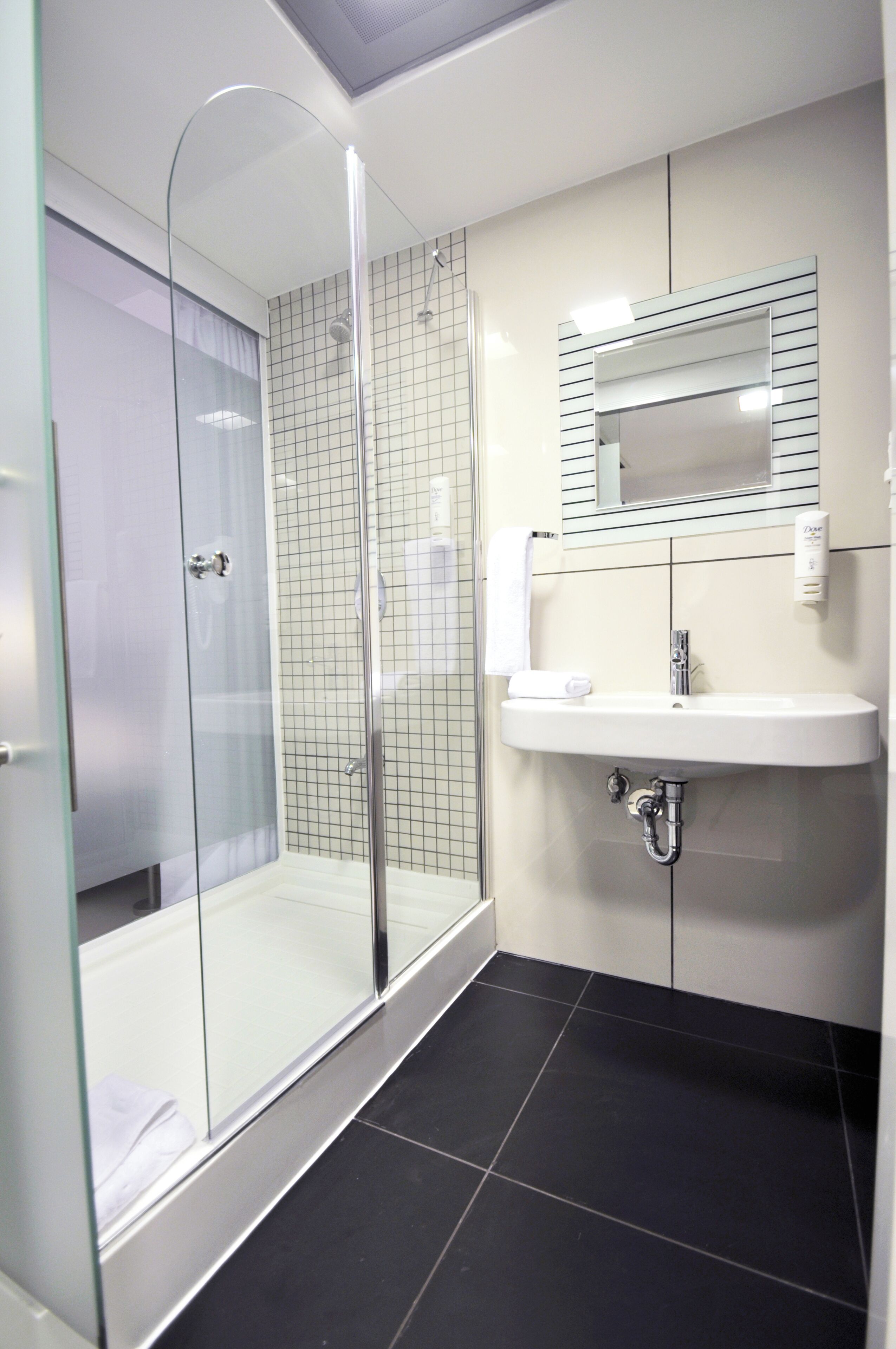 Shower, free toiletries, hair dryer, slippers