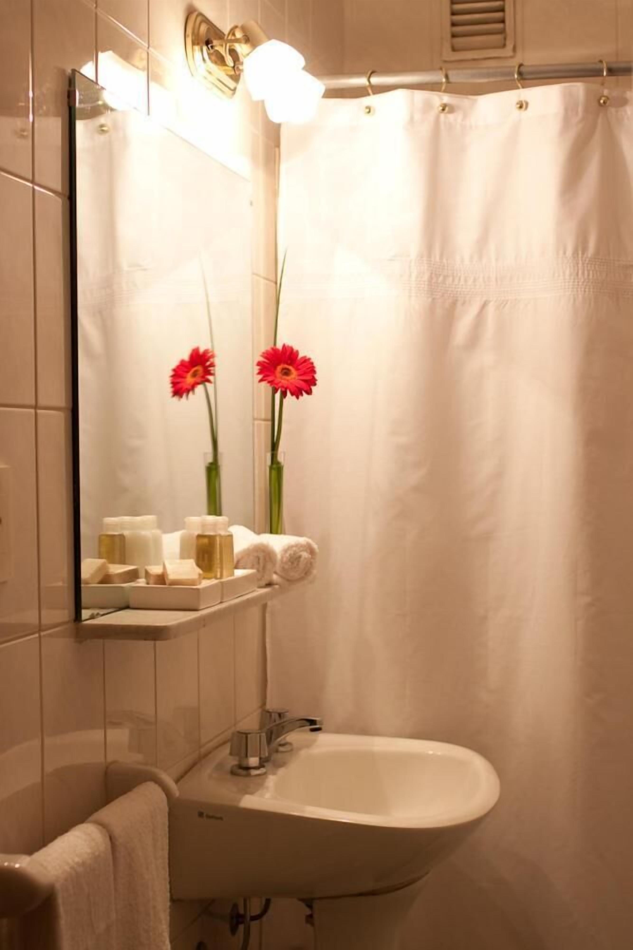 combined shower/bathtub, deep-soaking bathtub, rainfall showerhead