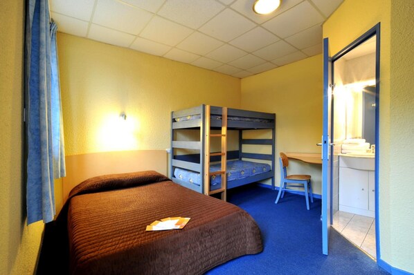 Desk, blackout curtains, free cots/infant beds