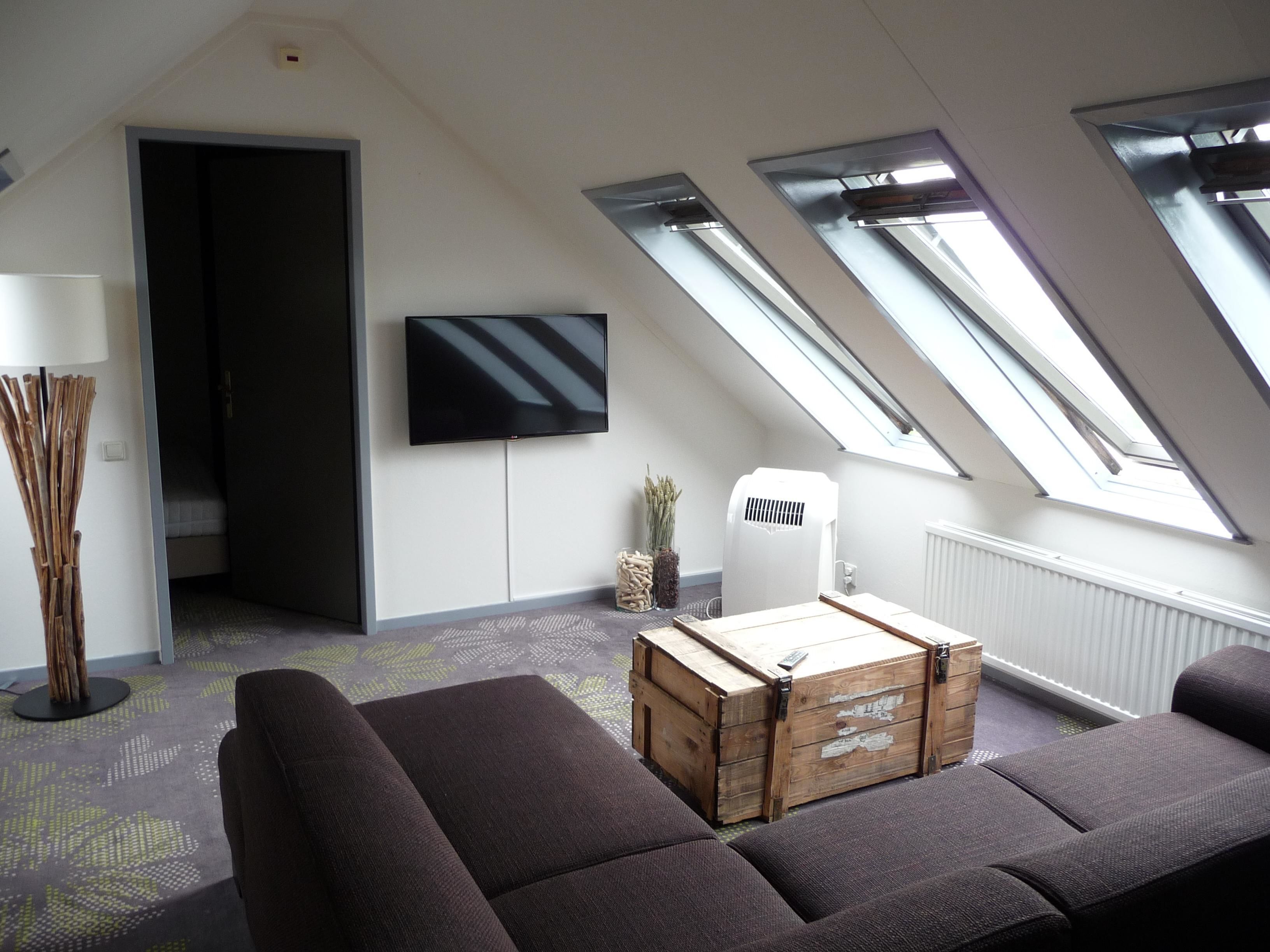 family room | desk, blackout curtains, soundproofing, free wifi