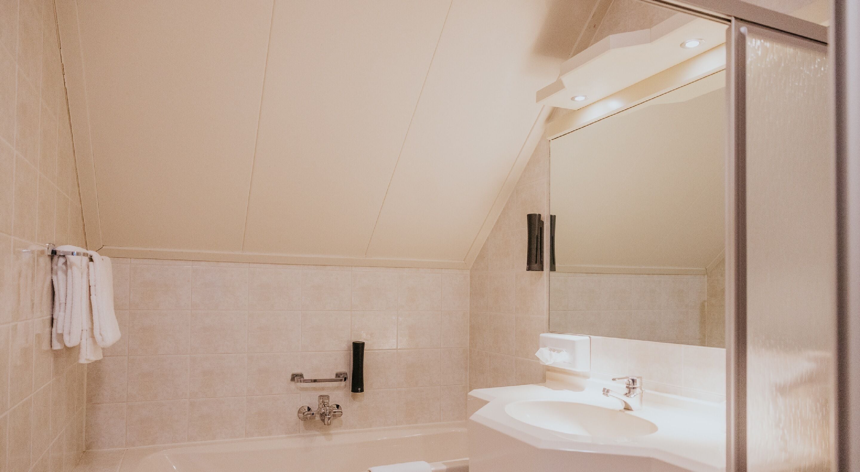 deluxe twin room | bathroom | hair dryer, towels
