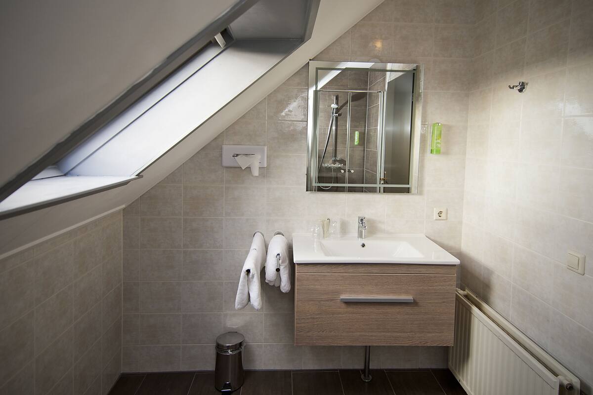 family room | desk, blackout curtains, soundproofing, free wifi