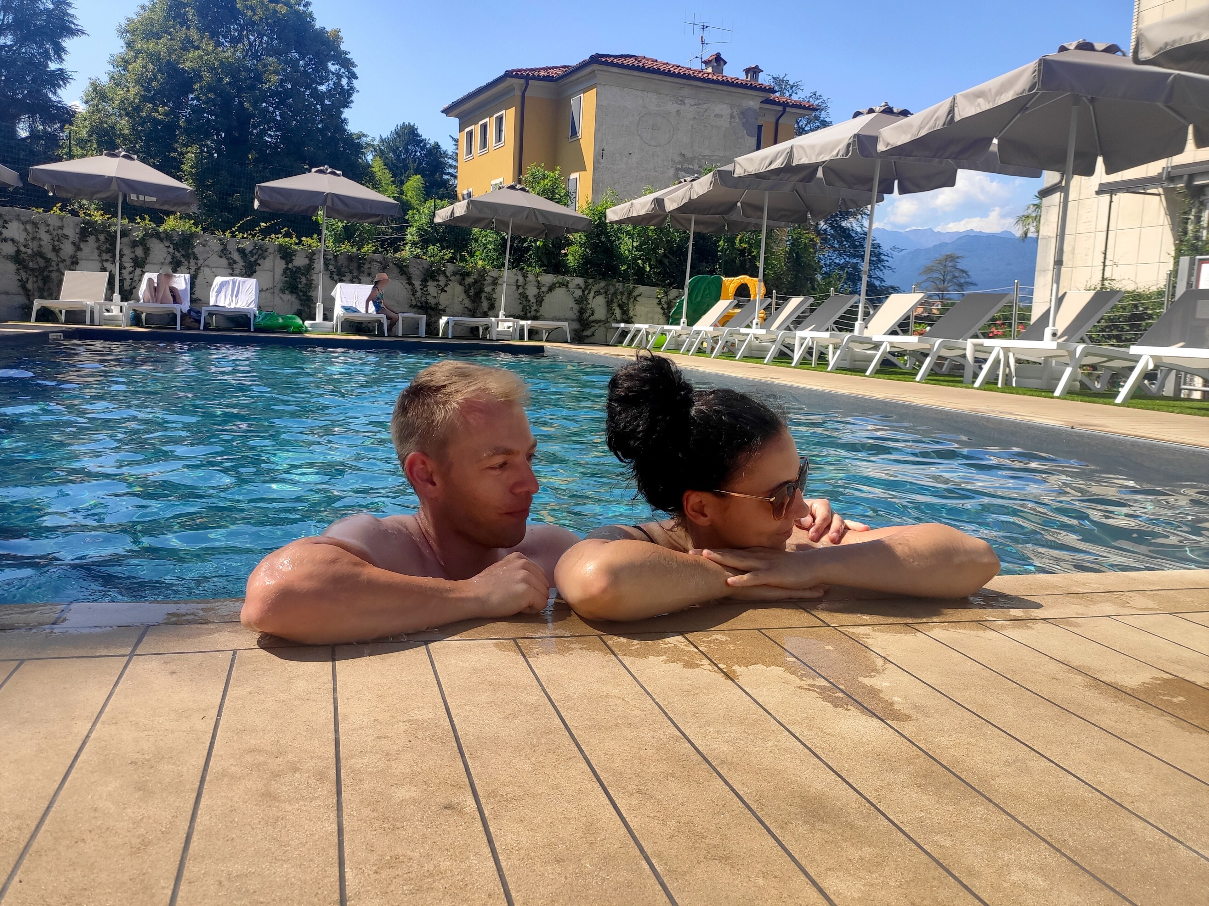 Seasonal outdoor pool, open 8:00 AM to 7:30 PM, pool umbrellas