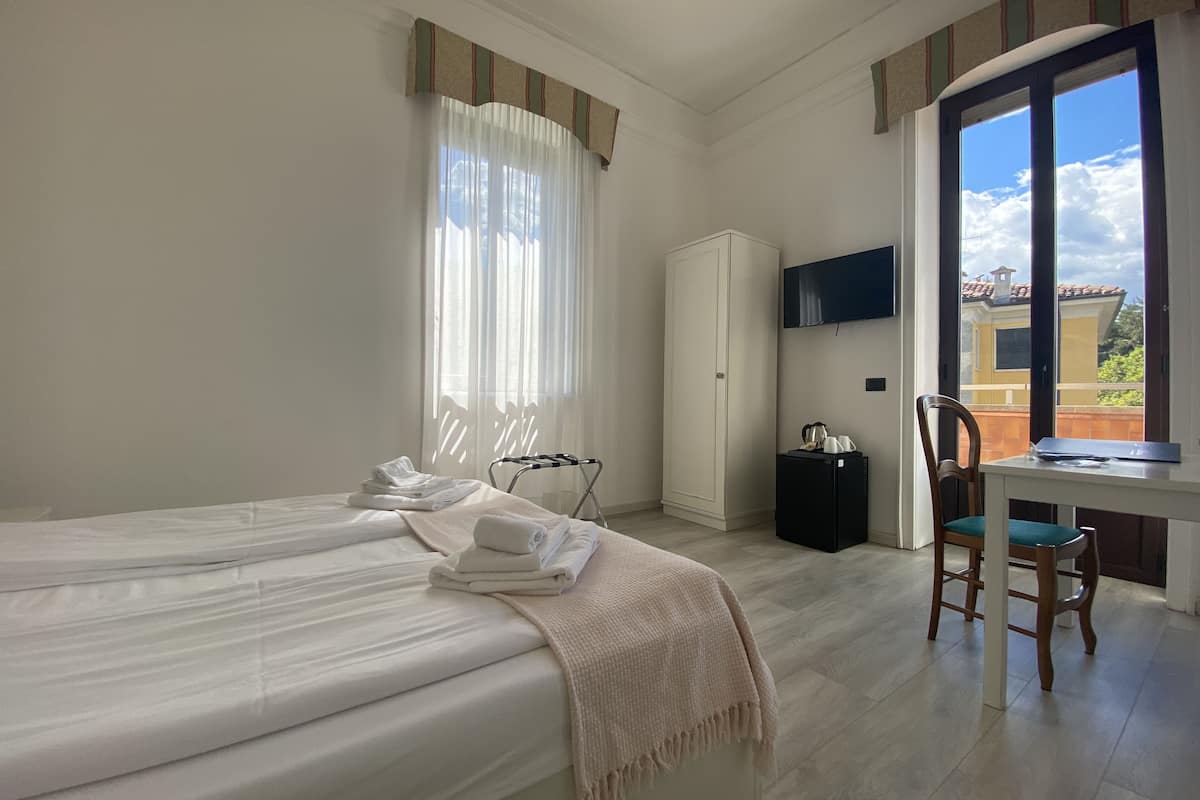 standard room, courtyard area | down duvets, memory-foam beds, minibar, in-room safe