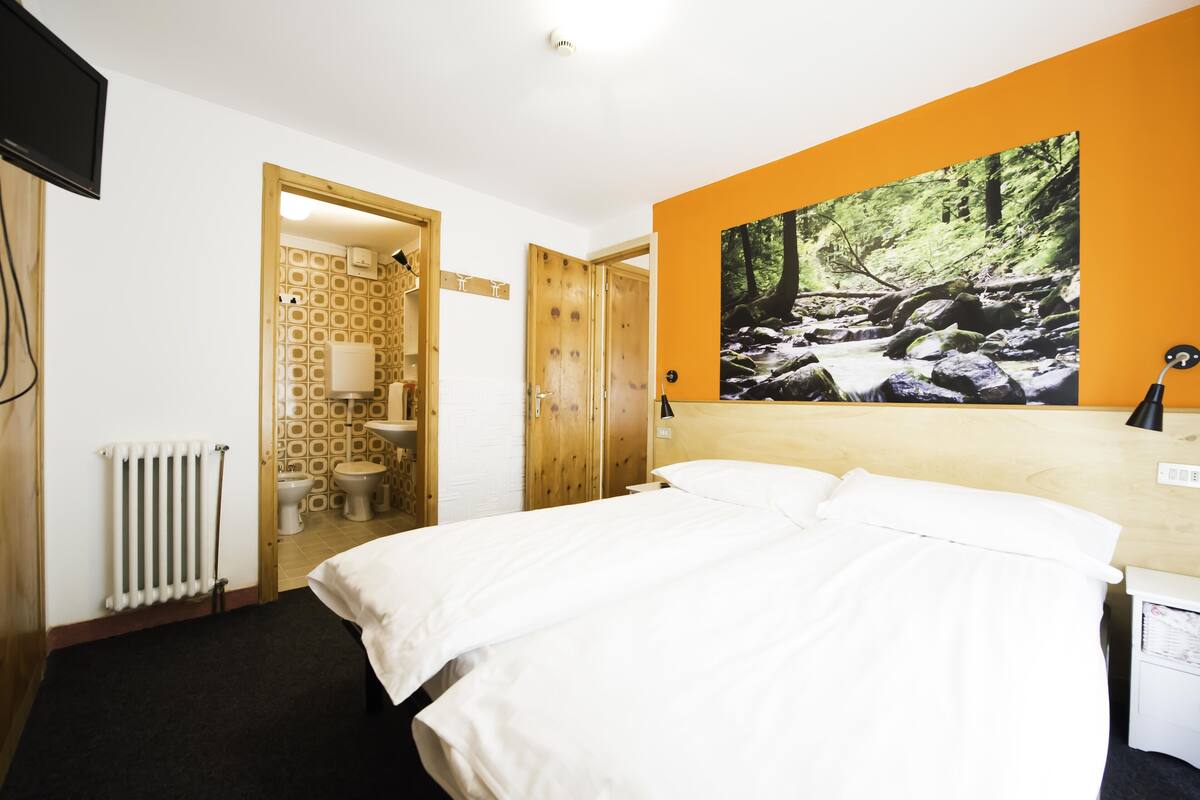 Two Connecting Rooms, Balcony | In-room safe, blackout drapes, WiFi (free), bed sheets