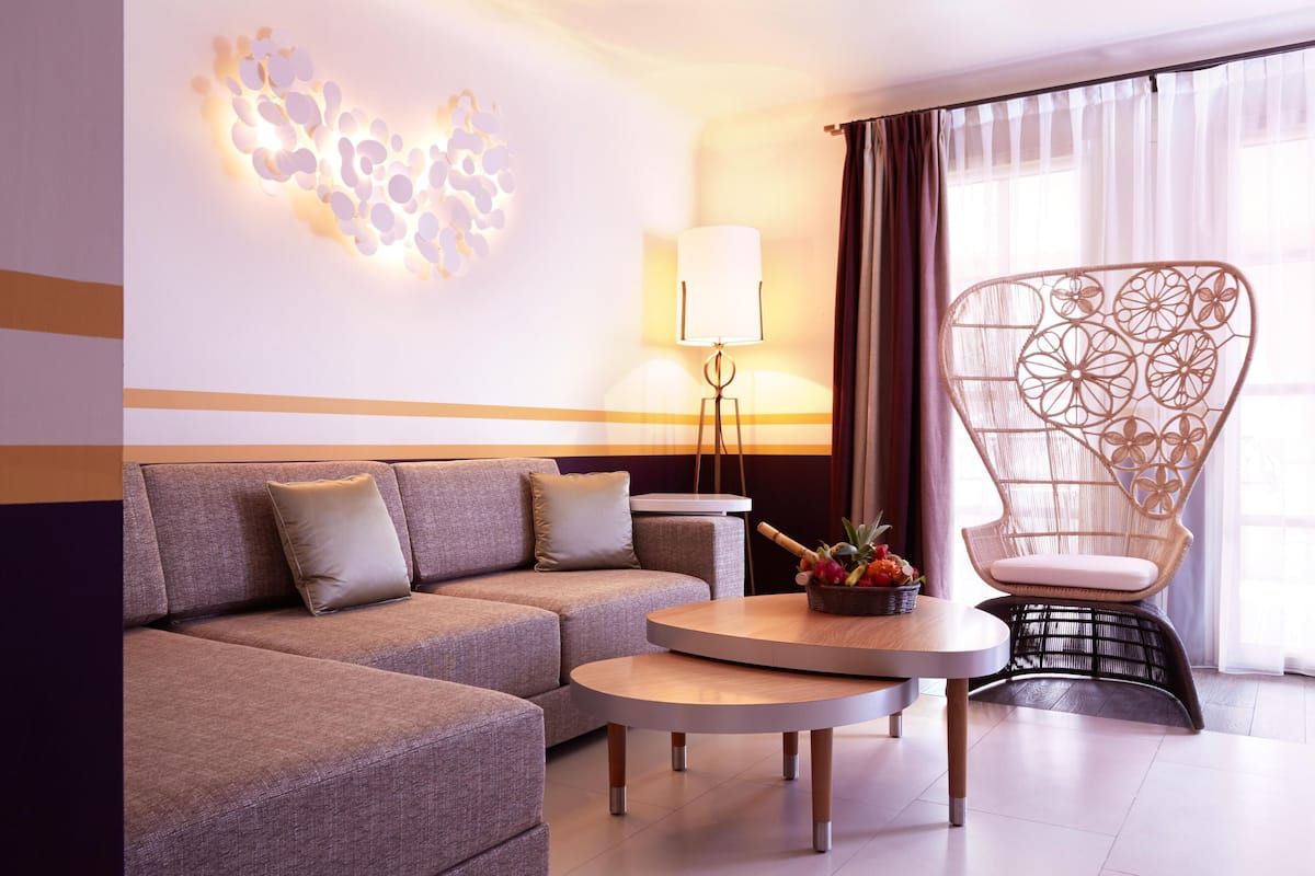 Suite, terrasse | Literie de qualité supérieure, mini-bar avec articles gratuits