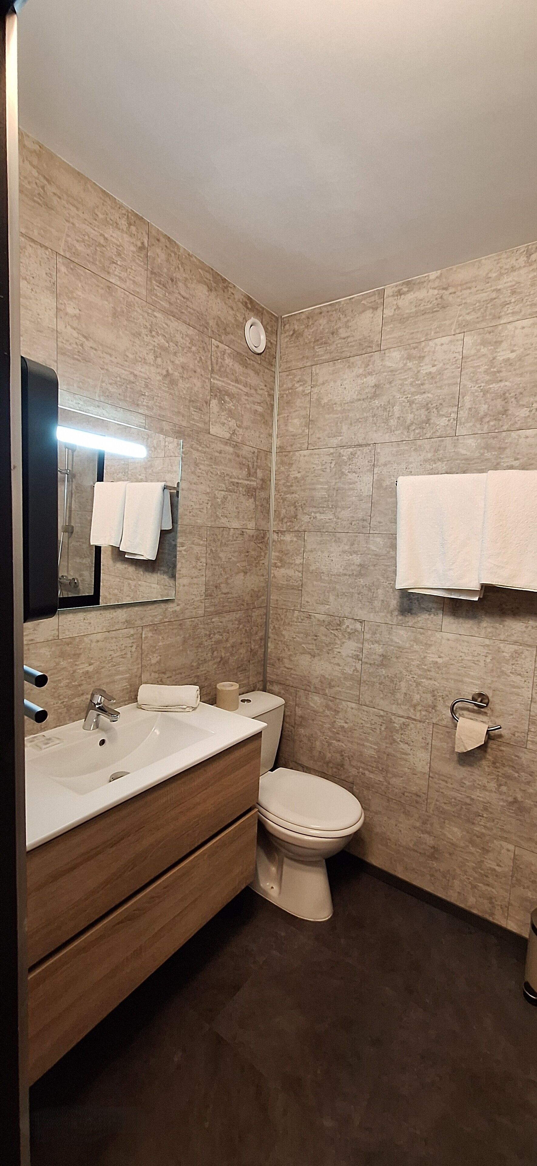 superior double room | bathroom | hair dryer, towels