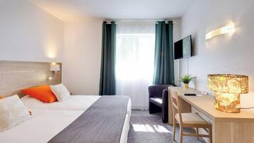 Economy Double Room | Select Comfort beds, desk, free WiFi, bed sheets