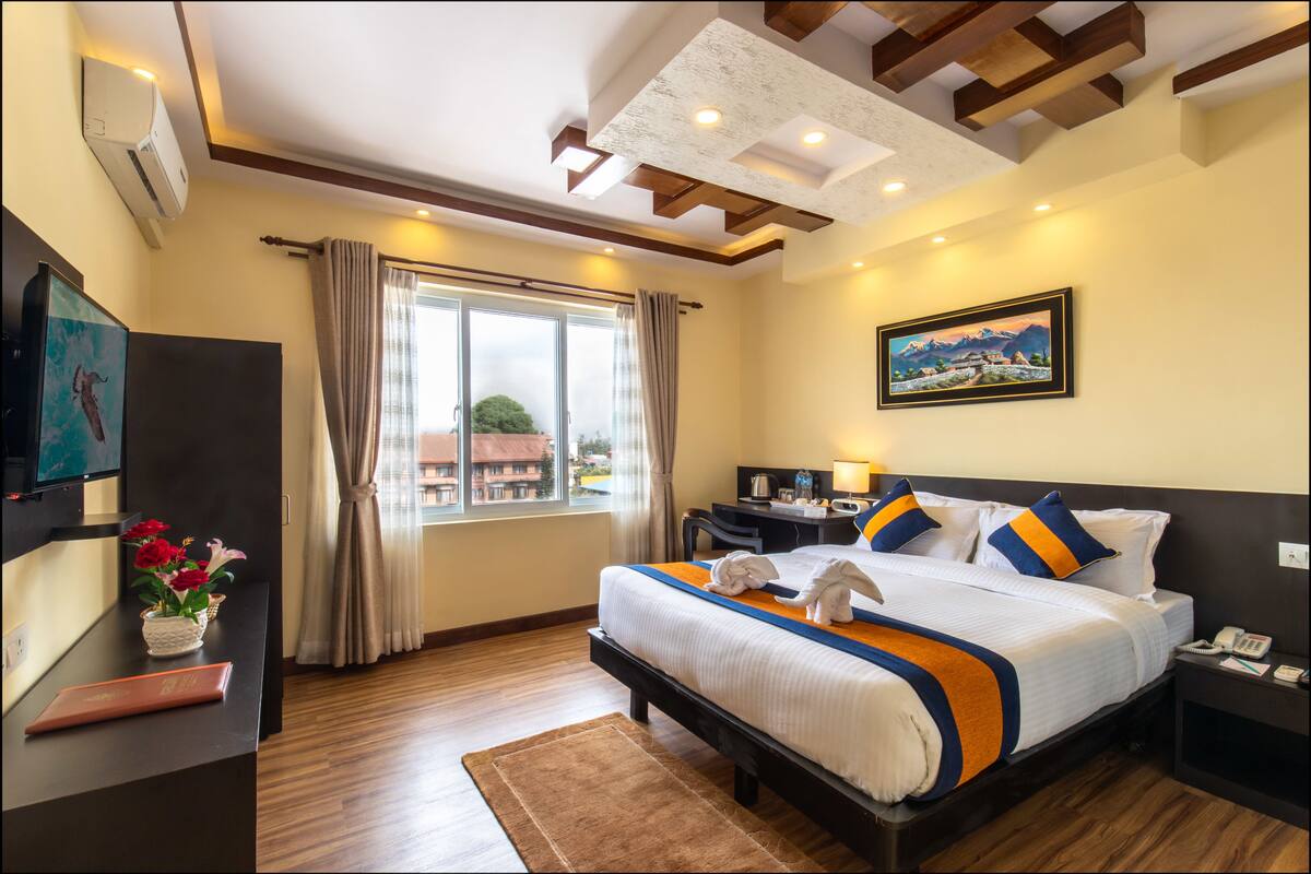 Premium bedding, memory foam beds, desk, laptop workspace