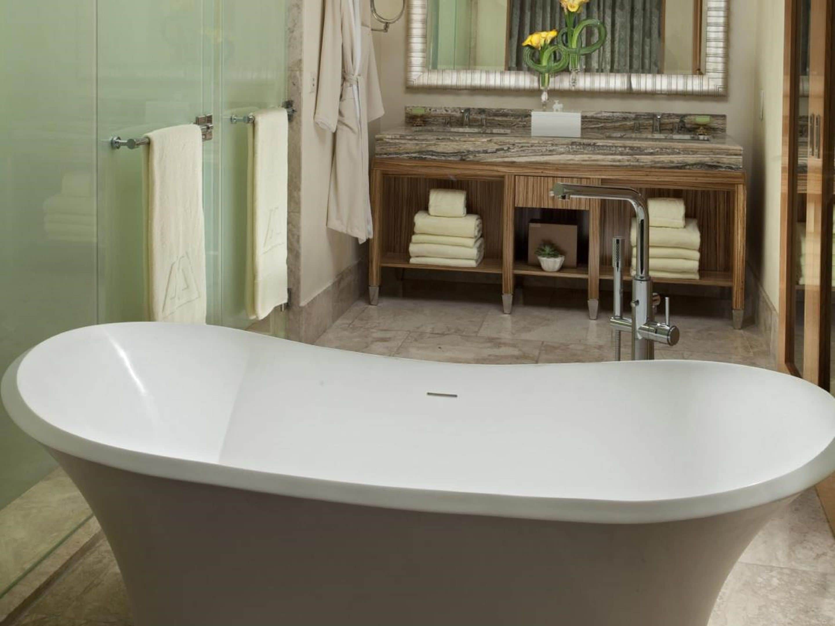 separate bathtub and shower, deep-soaking bathtub, rainfall showerhead