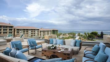 3 bars/lounges, poolside bar, beach bar