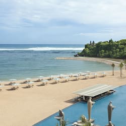 Private beach, white sand, sun loungers, beach umbrellas