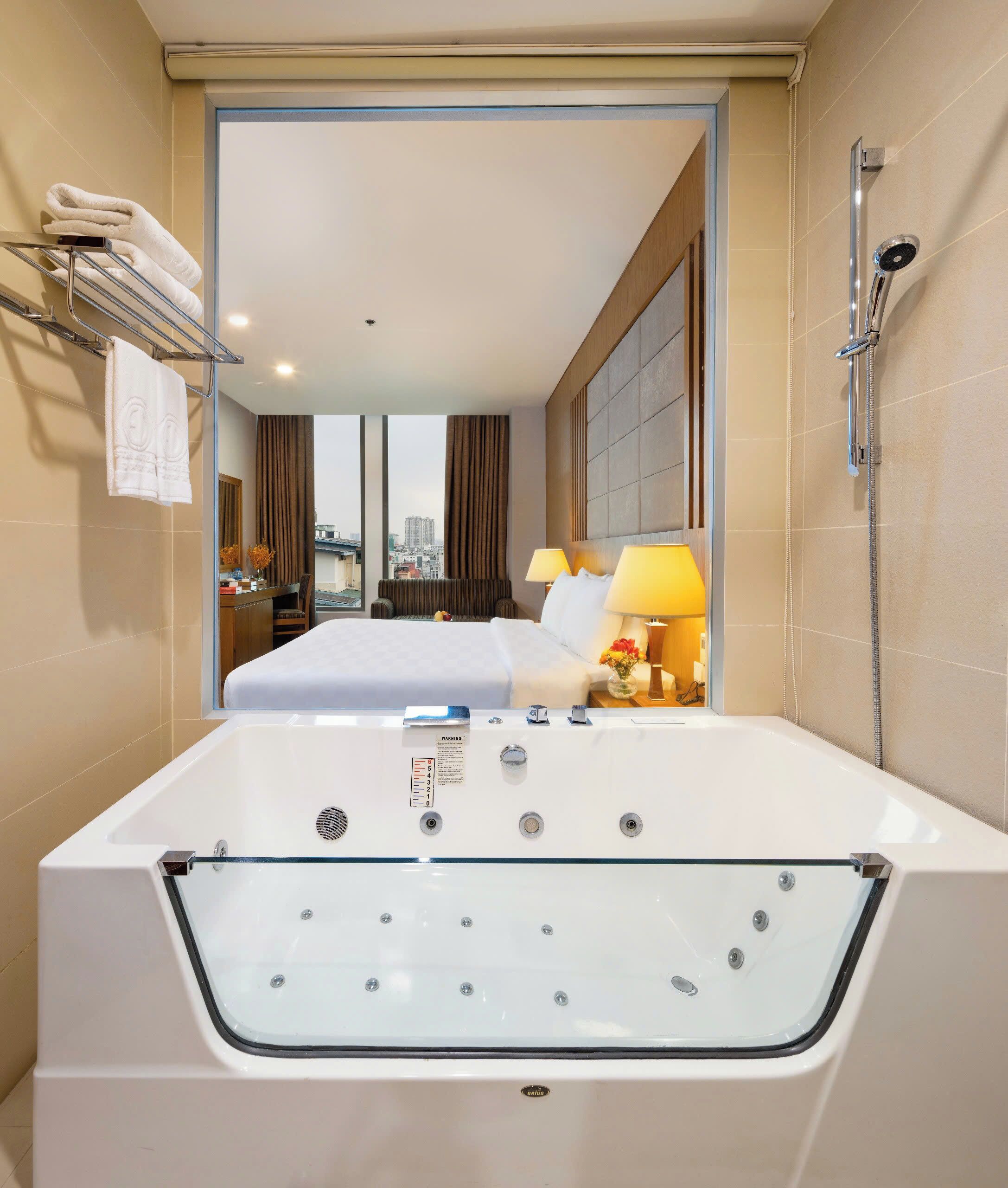 executive city view with daily afternoon tea | bathroom | free toiletries, hair dryer, bathrobes, slippers