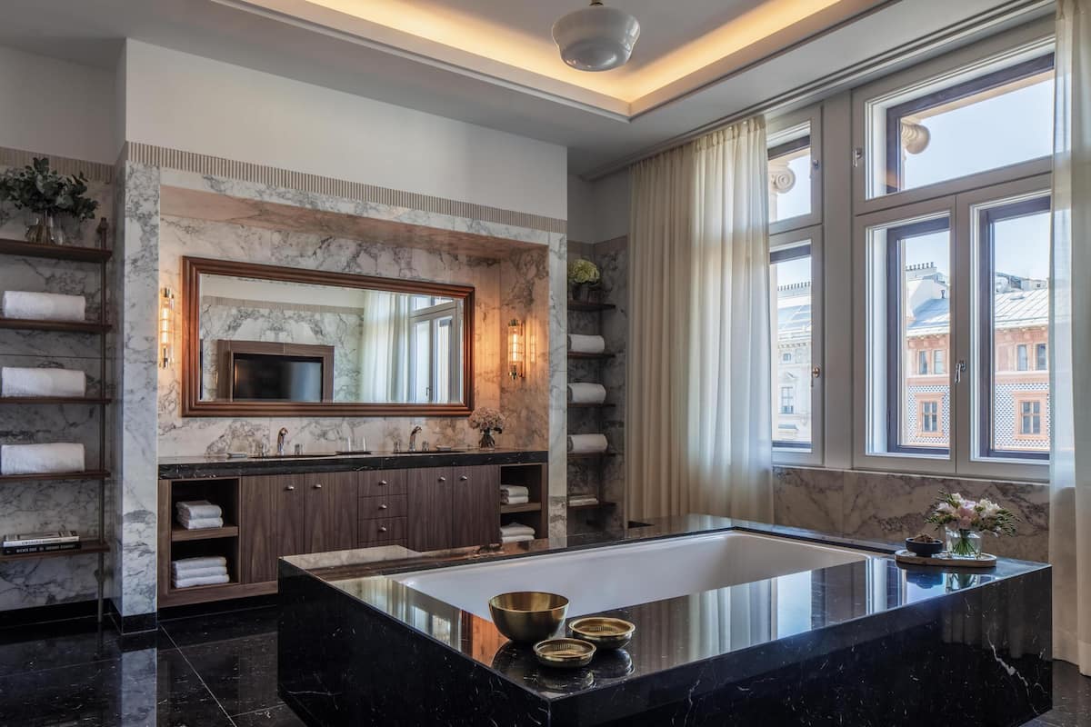 separate bathtub and shower, deep-soaking bathtub, rainfall showerhead