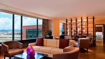 Presidential Suite, 1 Bedroom | Living area | 42-inch flat-screen TV with cable channels, TV, pay movies