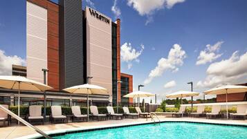 Outdoor pool, open 5:00 AM to 9:00 PM, pool umbrellas, pool loungers