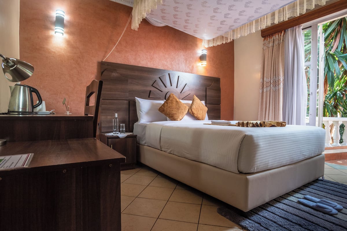 Habitación ejecutiva | Caja fuerte, sistema de insonorización, wifi gratis y ropa de cama