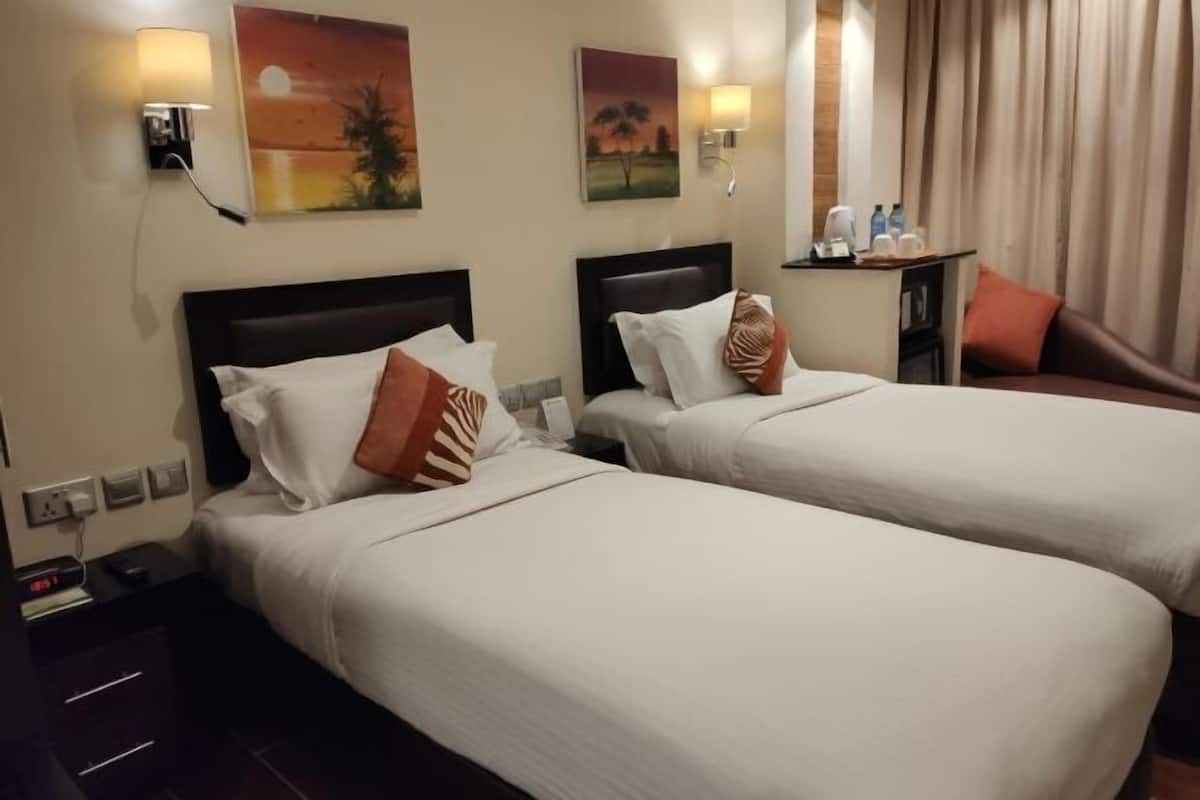 Egyptian cotton sheets, premium bedding, minibar, in-room safe