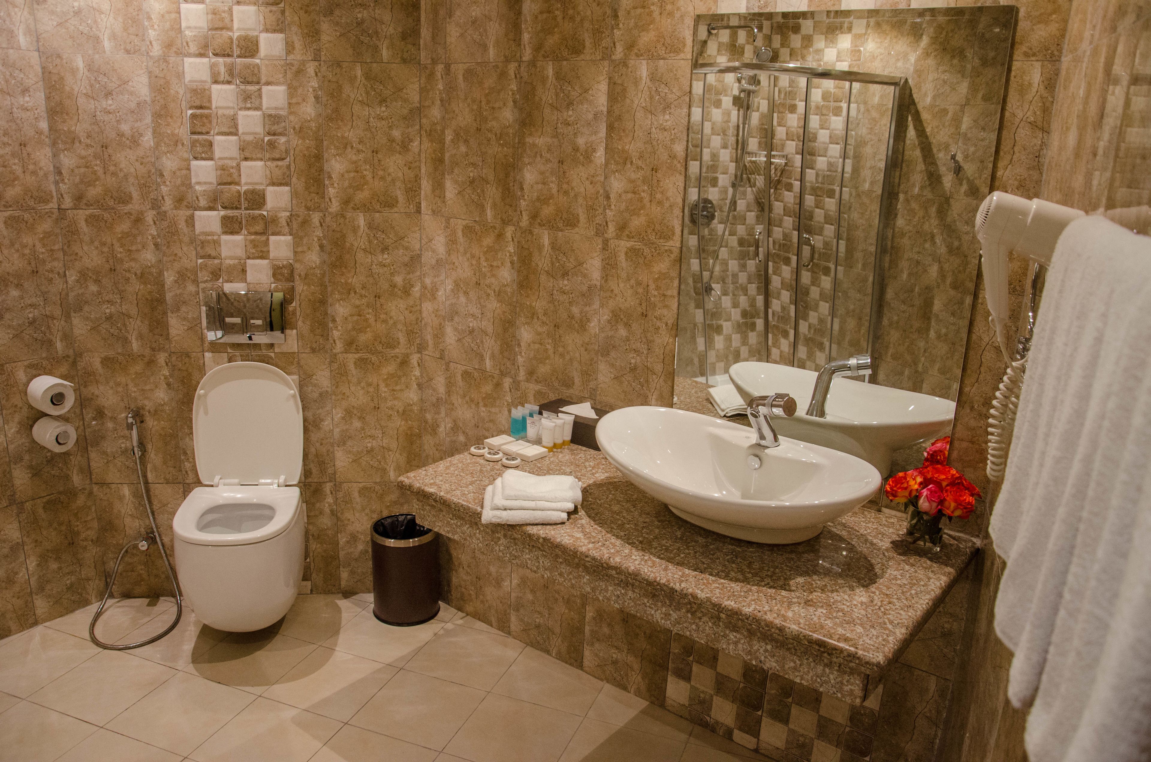 family suite, 2 single beds, non smoking (third bed is single bed) | bathroom | shower, free toiletries, hair dryer, towels