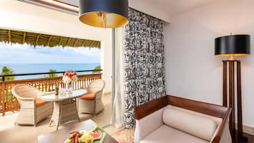 Ocean Suite | Living area | 58-inch LCD TV with digital channels, TV