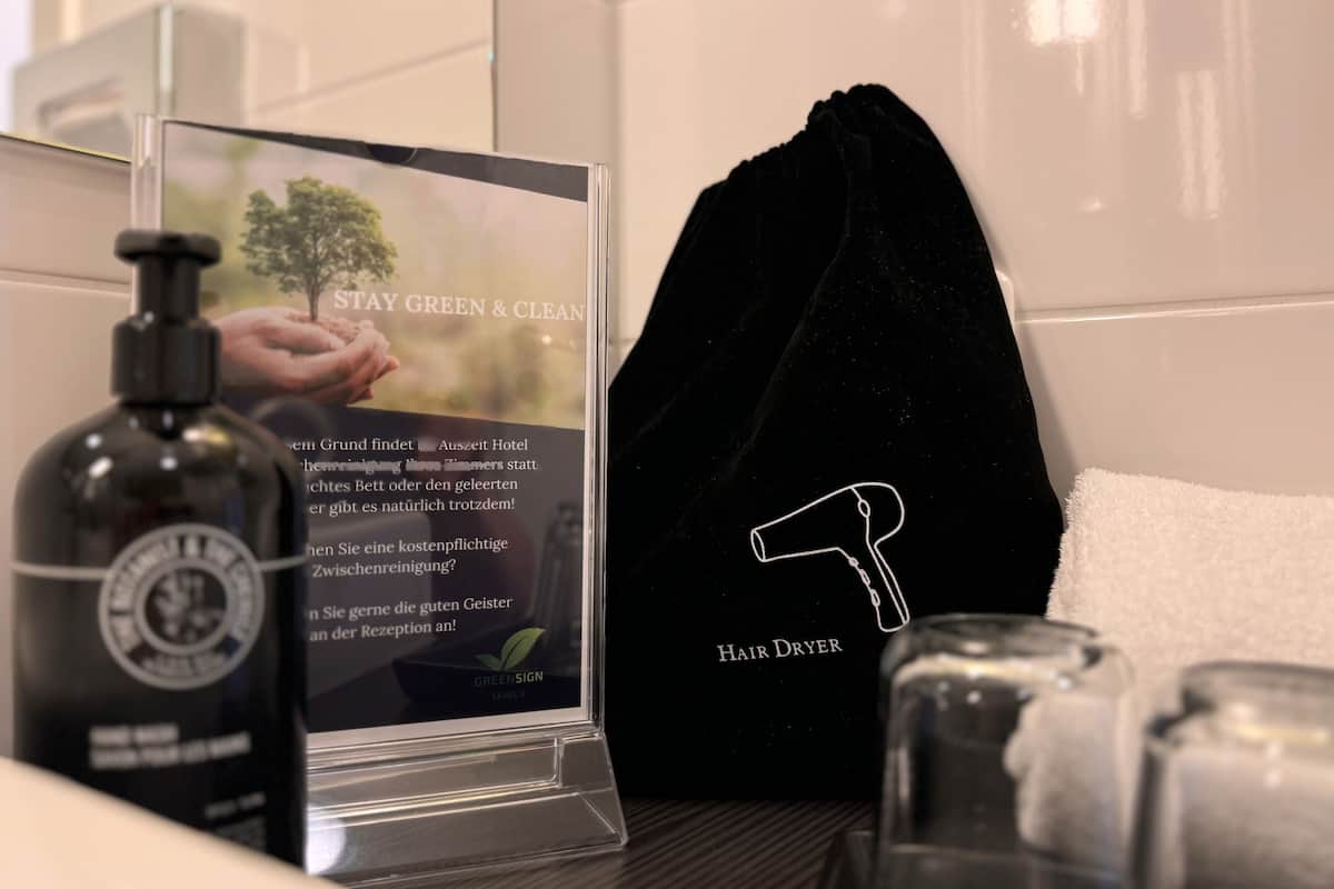 economy double room | bathroom | shower, free toiletries, hair dryer, slippers