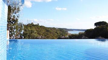 Outdoor pool, pool umbrellas, pool loungers
