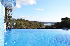 Outdoor pool, pool umbrellas, pool loungers