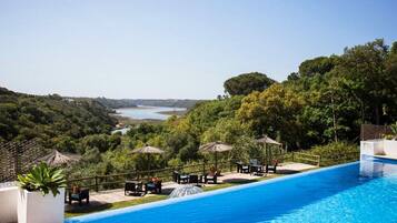 Outdoor pool, pool umbrellas, pool loungers