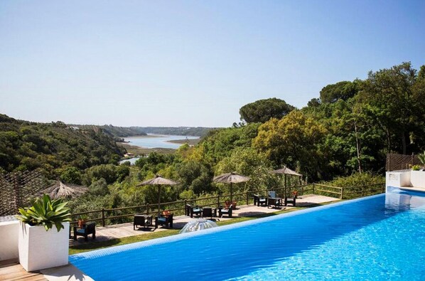 Outdoor pool, pool umbrellas, pool loungers