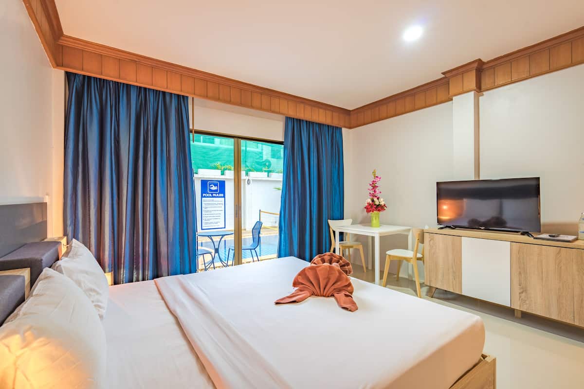 Superior Room, Garden View | Een kluis op de kamer, een bureau, gratis babybedden, extra bedden