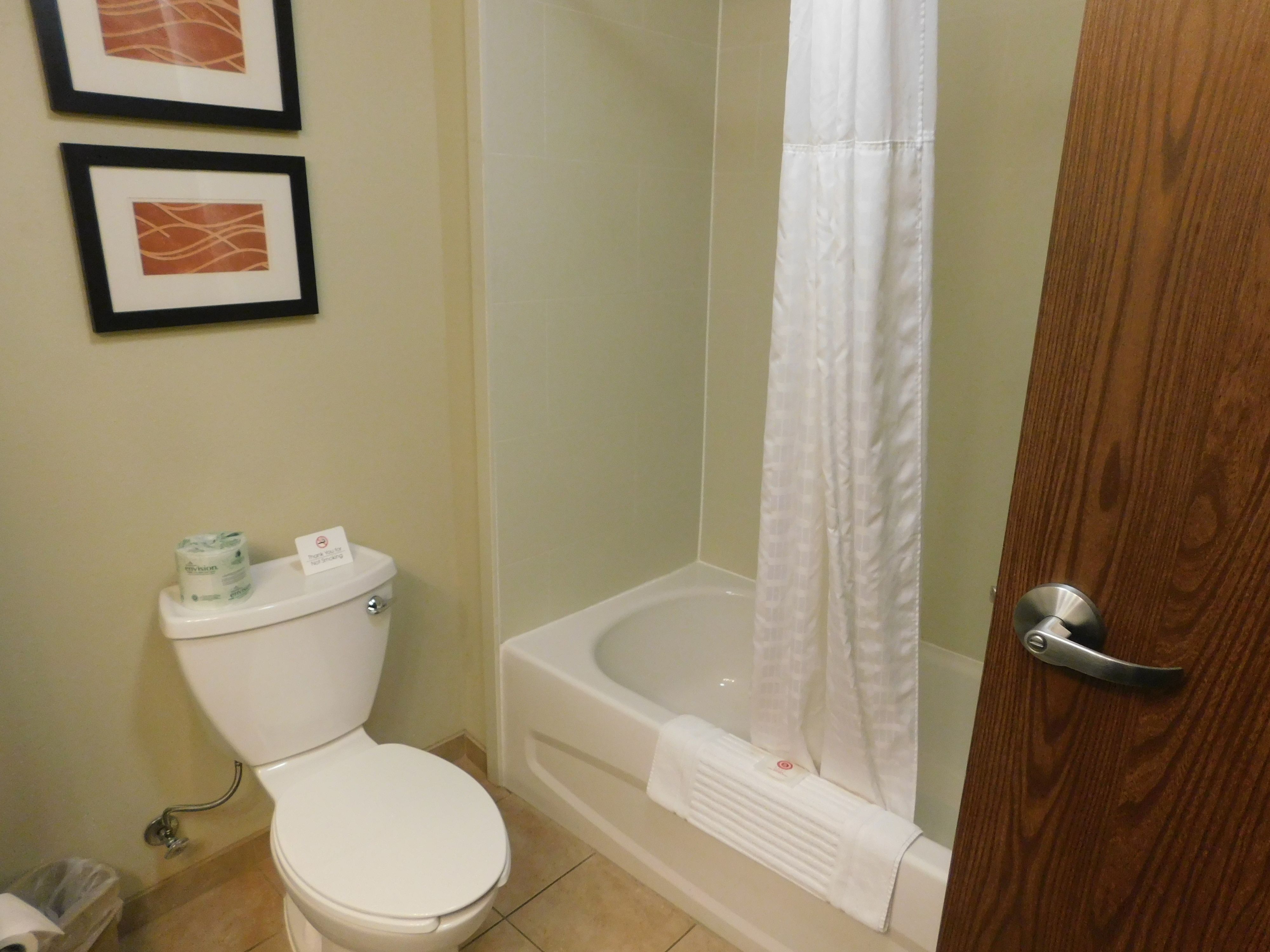 desk, laptop workspace, blackout curtains, iron/ironing board