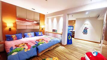 Cozy retreat with a large bed, round table, and playful decor.