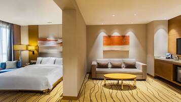 Suite, 1 King Bed | Minibar, in-room safe, desk, iron/ironing board