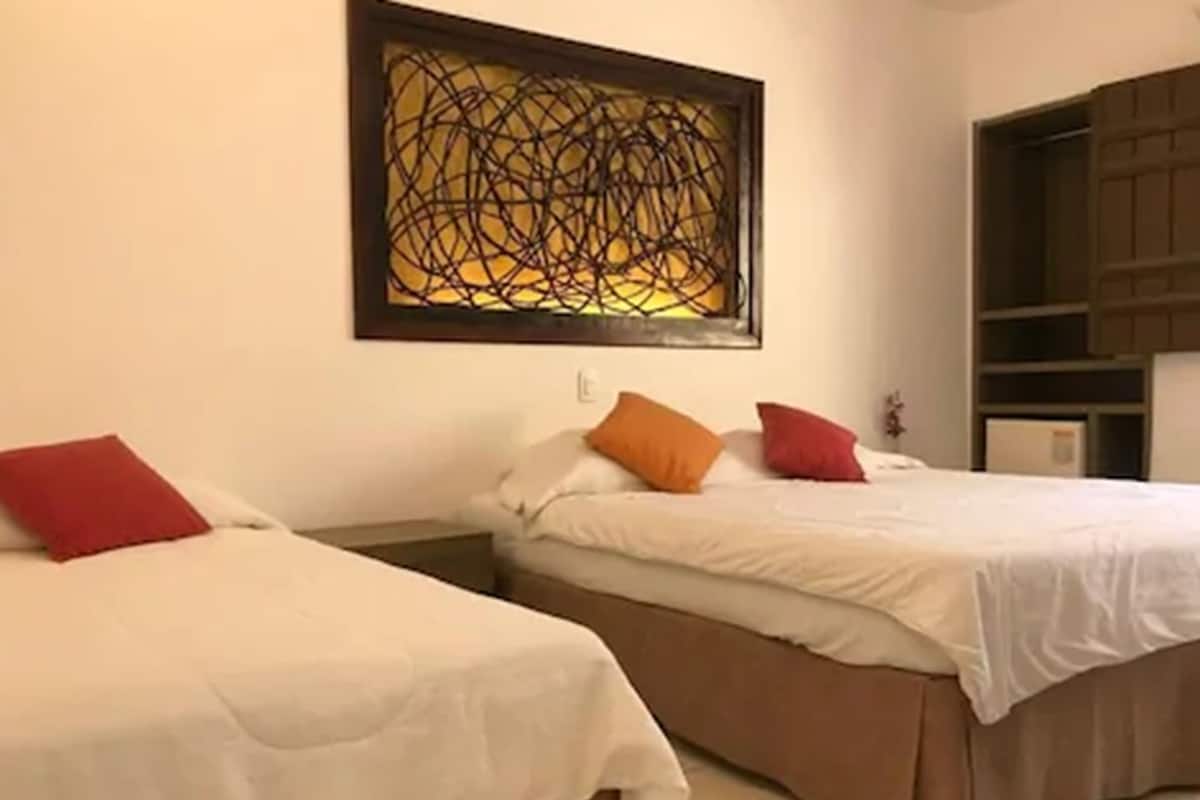 Apartamento Standard Triplo | Een minibar, individueel gemeubileerd, een bureau, gratis wifi