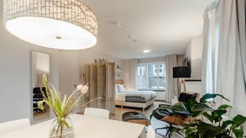 Apartment, Kitchen, City View | 1 bedroom, hypo-allergenic bedding, down comforters, minibar